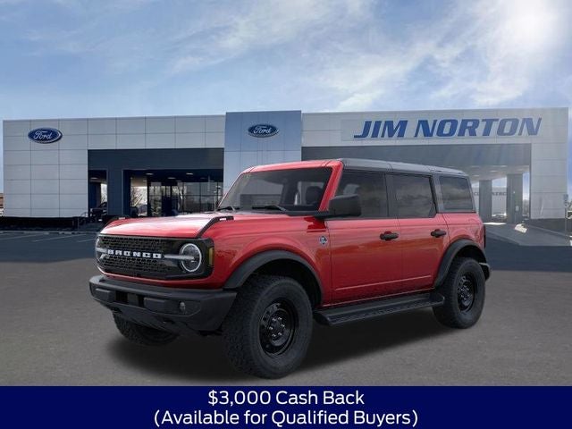 2026 Ford Bronco Outer Banks in Ruby Red Metallic — front three-quarter view