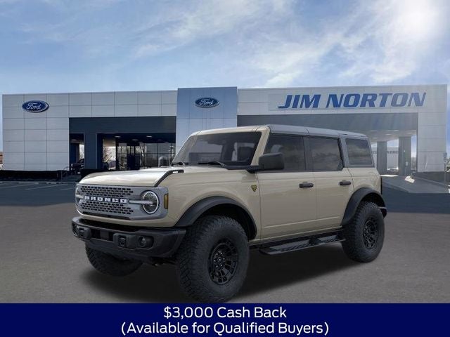 2026 Ford Bronco Badlands in Desert Sand — front three-quarter view