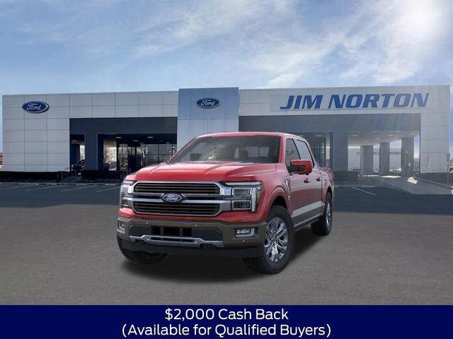 2026 Ford F-150 King Ranch in Ruby Red — front three-quarter view