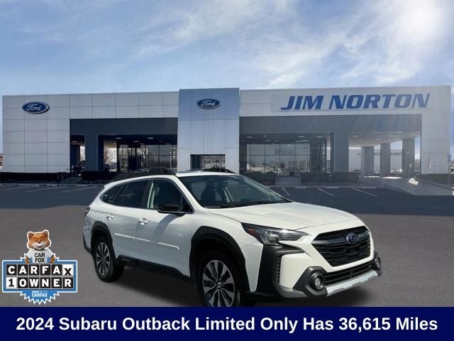 2024 Subaru Outback Limited in Crystal White Pearl — front three-quarter view